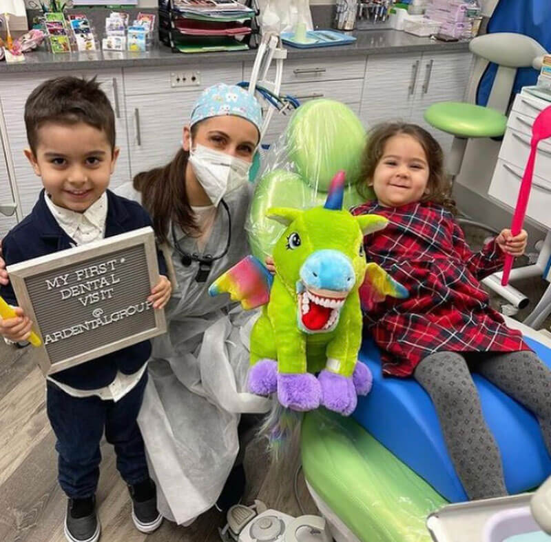 two preschool kids in a dental exam room for their first exam with Dr. Liza Idelchik